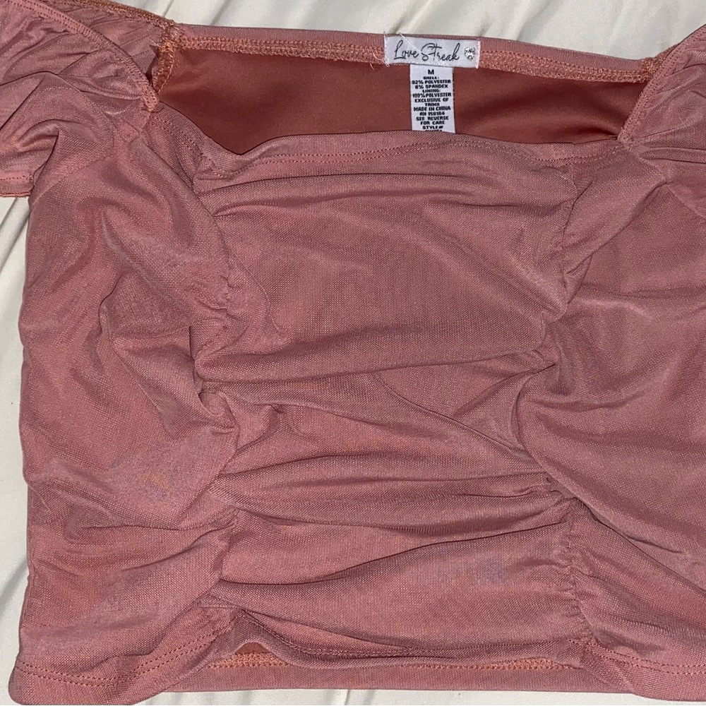 Off the shoulder pink mauve crop top.